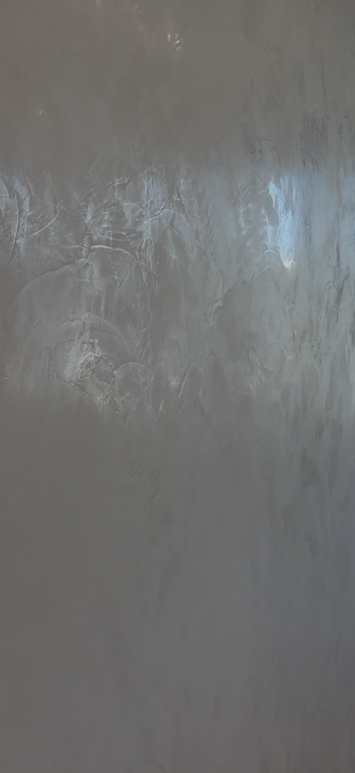 Pewter-toned Grassello panel burnished to a mirror sheen
