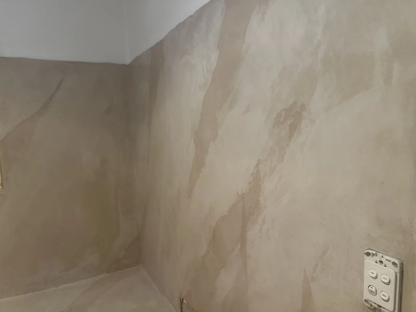 Warm Marmorino Venetian plaster wall with soft stone movement